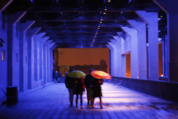 24 hours: New York, US: Pedestrians walk along the High Line in snow