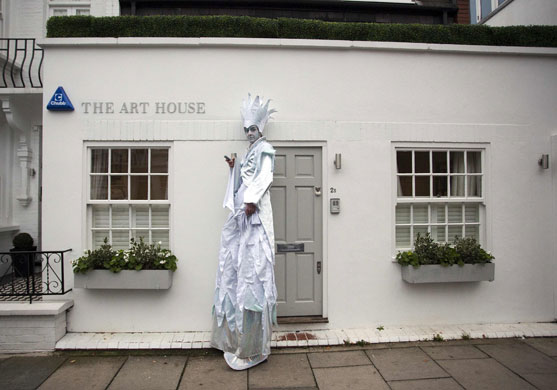 24 hours: London, UK: A performer dressed as the Ice King takes a break