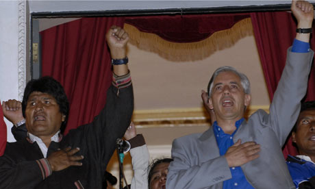 Bolivian president, Evo Morales, and vice-president, Alvaro Garcia Linera, celebrate the election victory in La Paz. Photograph: Jorge Bernal/AFP/Getty Images