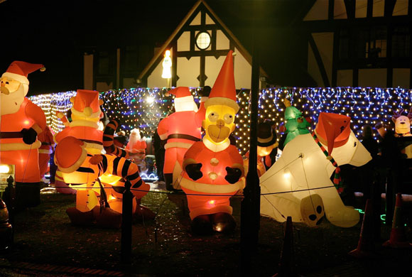 Christmas decorations: The illuminated house of Vic Moszcyznski in Sonning, UK