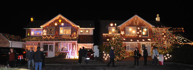 Christmas decorations: Christmas lights on houses in Trinity Close, Burnham-on-Sea