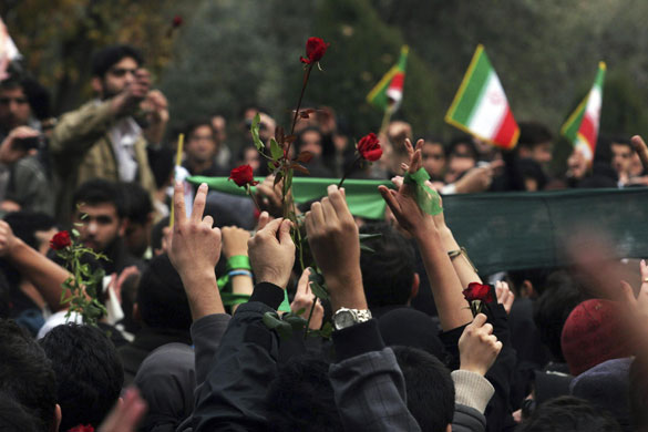 More violence in Tehran: Students show victory signs and red roses during protests in central Tehran