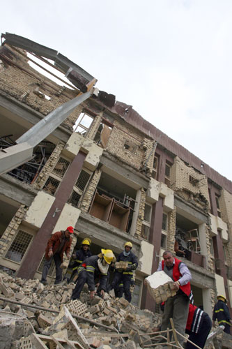 Baghdad bomb attacks: The site of a bomb blast outside a criminal court building