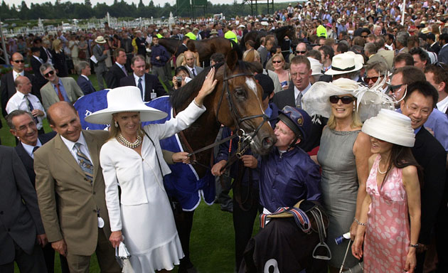 Mick Kinane Life: Winning jockey Mick Kinane kisses Galileo after their victory