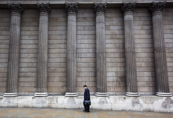 Year in Business: A man walks past the Bank of England in the City of London