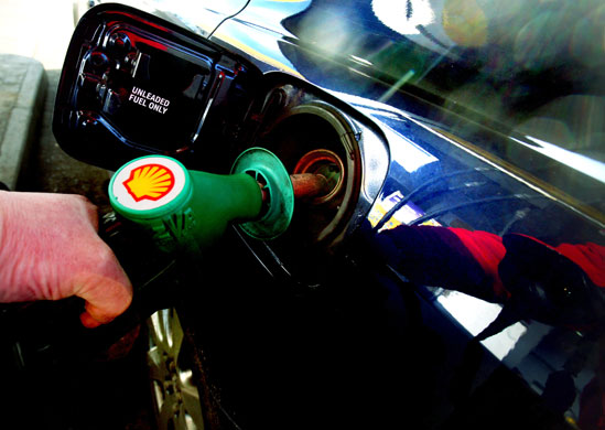 Year in Business: Filling a car with petrol at a Shell garage