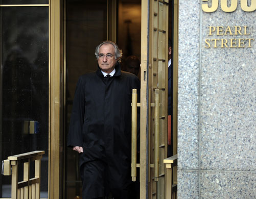 Year in Business: Bernard L Madoff leaves US Federal Court after a hearing