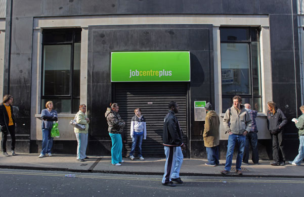 Year in Business: People queue outside a Job Centre in Bristol