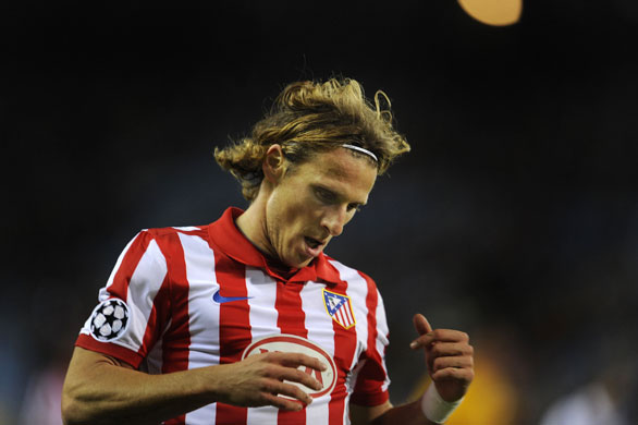 Rest of Tuesday Matches: Atletico Madrid's forward Diego Forlan as he rues a missed chance 