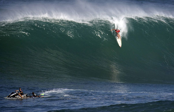 Hawaii waves: Professional surfer Peter Mel drops into a 35-foot wave