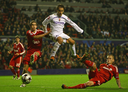 Wednesday CL 2: Martin Skrtel clears the ball from Fiorentina's Alberto Gilardino