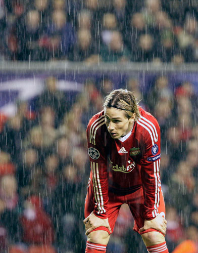 Wednesday CL 2: Liverpool's Torres stands in the rain 