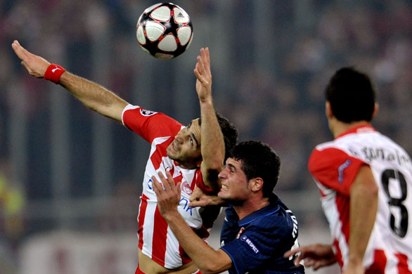 Wednesday CL 2: Olympiacos' Enzo Maresca and Arsenal's Fran Merida fight for a header 