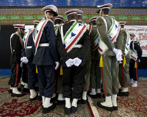 Gallery 24 hours in pictures: Honour guard at the anniversary ceremony of Iran's Islamic revolution. 
