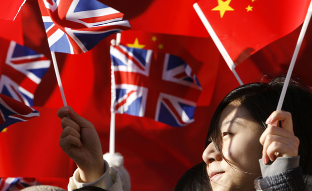 Gallery Chinese embassy protests: Pro-China demonstrators wave flags outside the Chinese Embassy in London.