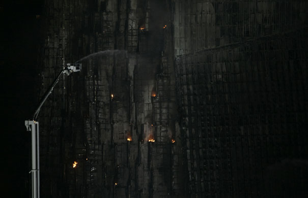 Beijing fire: A firefighter at the soon to-be-opened Mandarin Oriental