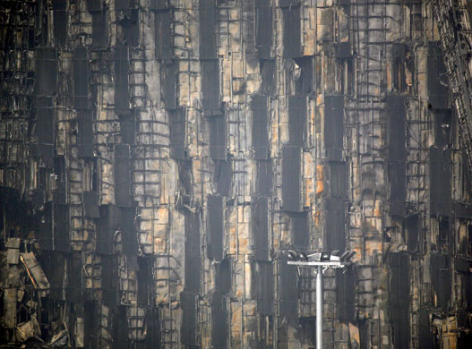 Beijing fire: Fire-damaged rooms in the Mandarin Oriental hotel