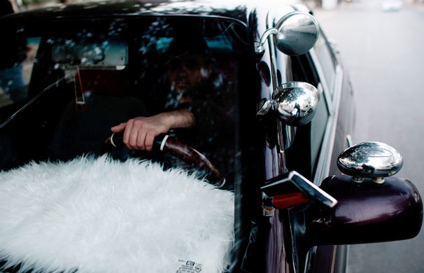 24 hours in pictures : Iraqi Car Culture Reflects Globalization And Increased Security