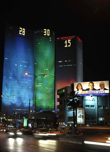 Elections in Israel: Numbers on the top of Azrieli Towers in Tel Aviv display exit poll results