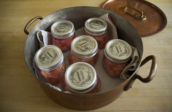 Rhubarb bottling: Line a large pot with a teatowel
