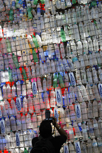 11 February 2009: Mumbai, India: A structure made from plastic buckets and bottles