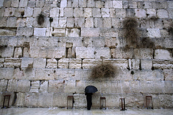 11 February 2009: Jerusalem, Israel: A Jewish worshipper stands at the Western Wall