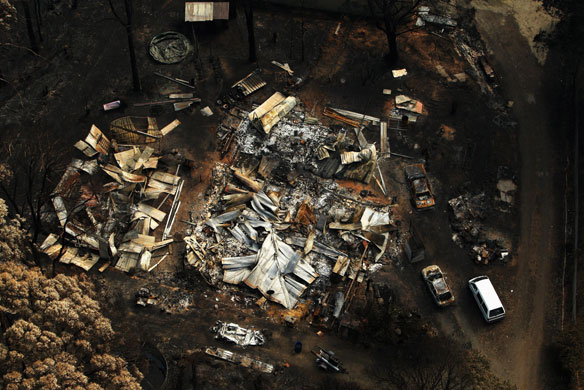 Bushfire devastation: The burnt out remains of a house in Kinglake