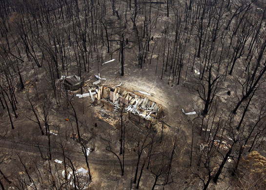 Bushfire devastation: The burnt out remains of a house in the Kinglake region