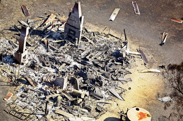 Bushfire devastation: The burnt out remains of a house in the Kinglake region