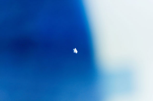 Space debris: Unidentified possible small debris seen from the space shuttle.