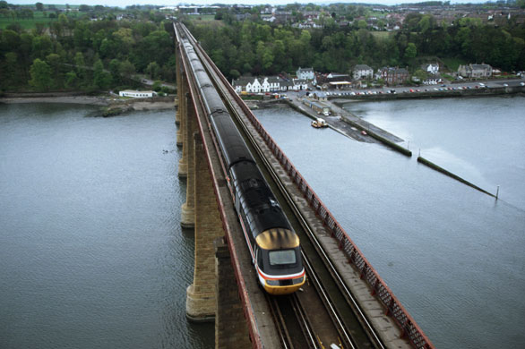 High-speed trains: A high speed Intercity train crosses the Forth Bridge in Scotland.