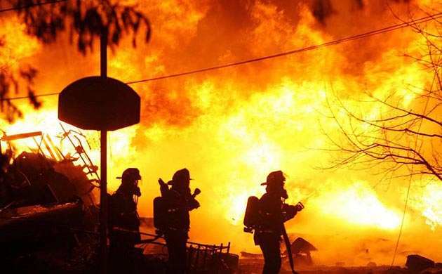 Firefighters spray water at the scene in Buffalo.