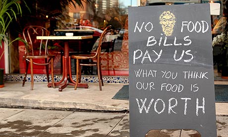 A sign displayed outside the Little Bay restaurant in Farringdon.