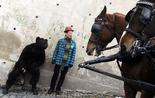 24 hours in pictures: Prague, Czech Republic: People in costume attend the Mala Strana Carnival.