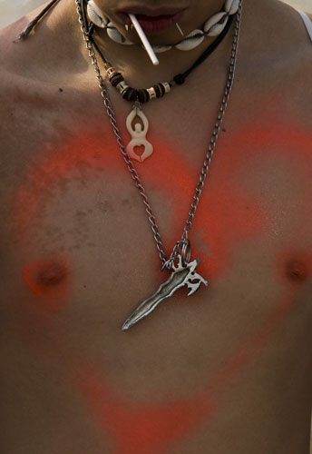 24 hours in pictures: Mexico City, Mexico: A man with a heart symbol painted on his chest.
