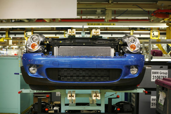Cowley mini production: A semi-assembled car on BMW's Mini production line in Cowley, Oxford.