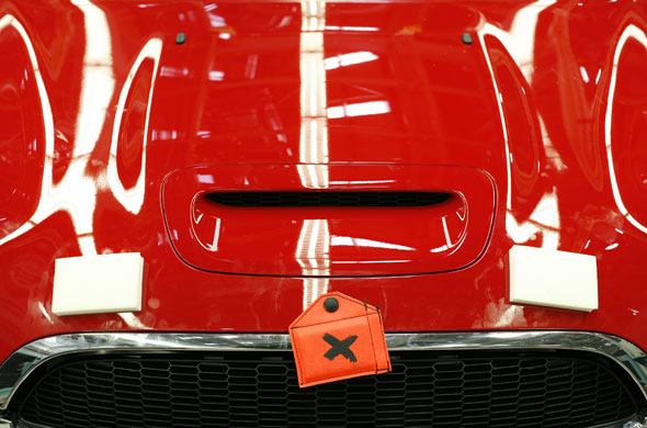Cowley mini production: Polished bonnet of a car on BMW's Mini production line in Cowley, Oxford.