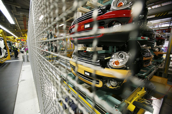 Cowley mini production: Semi-assembled cars on BMW's Mini production line in Cowley, Oxford.