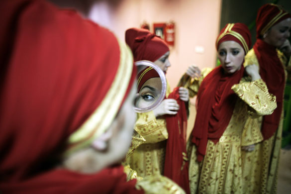 24 hours in pictures: Bosnian girls taking part in a mass prayer event for Gaza  