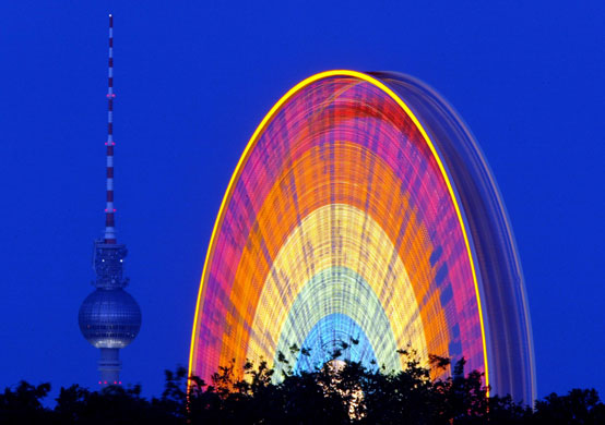 Big wheels : A giant wheel turns in Berlin, Germany.