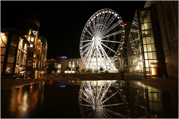 Big wheels : The Wheel of Manchester in Exchange Square.