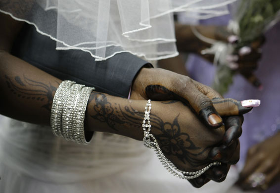 17 February 2009: Tel Aviv, Israel: Sudanese refugee couple Moaz and bride Sumia