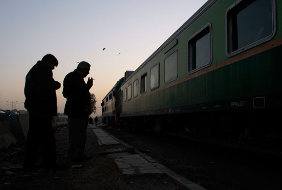 24 hours in pictures: baghdad's first commuter train line carries passengers 