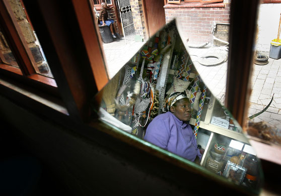 19 February 2009: Johannesburg, South Africa: A merchant at the Mai Mai market