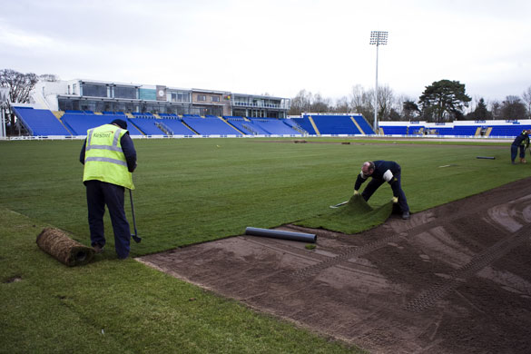 Swalec stadium: Groundsmen unroll the turf