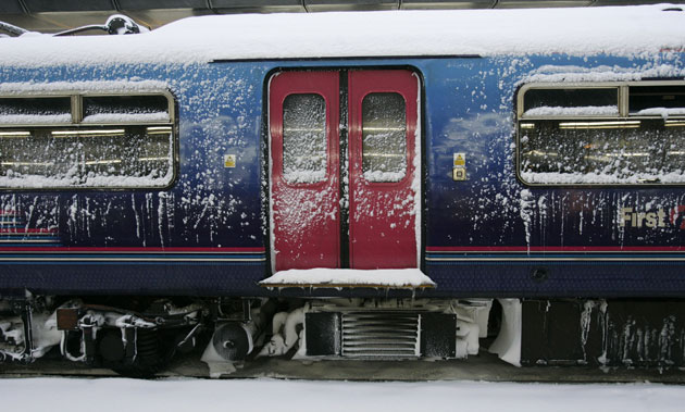 Gallery Snow in England: East Croydon: A snow covered train at the railway station in south London.