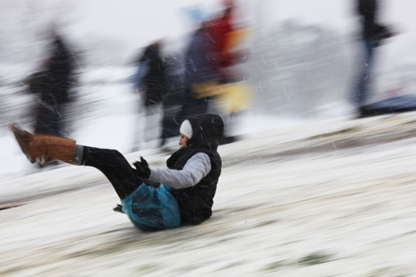 Gallery Snow update: Primrose Hill, London: People enjoy the snow.