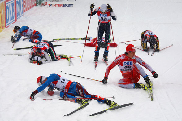 24 Sport: Exhausted competitors collapse in the snow