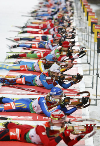 24 Sport: Marie Laure Brunet of France lines up to shoot