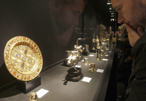 YSL art collection: A visitor looks at the display YSL exhibition